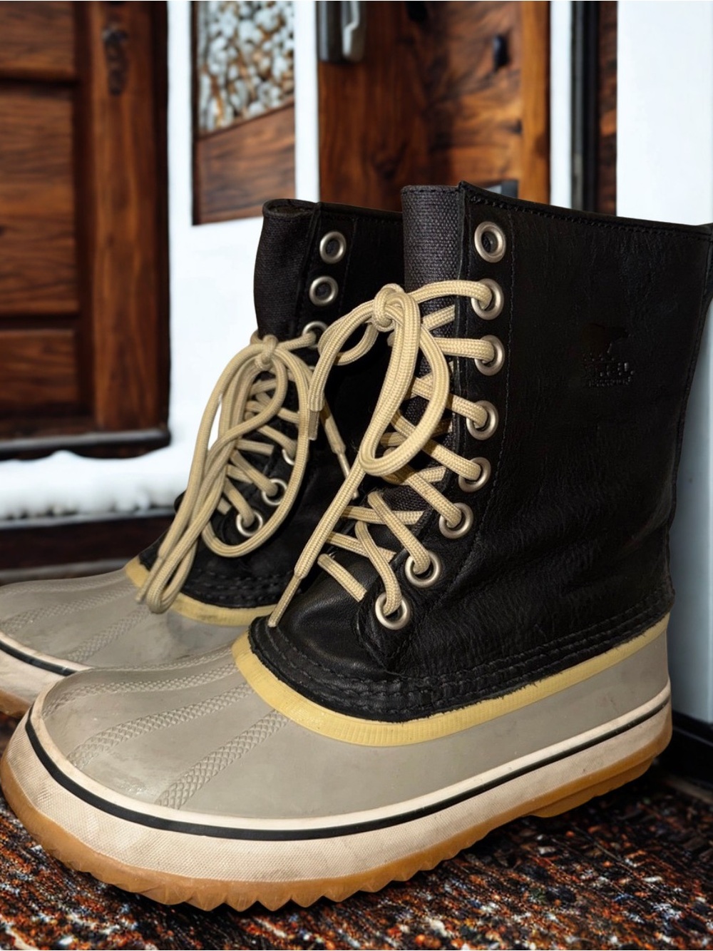 Sorel Black Leather Lace-Up Waterproof Boots with Tan Rubber Sole